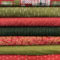 Preview: Baumwolle Webware unelastisch - Weihnachtsstoff grün mit weißem Schuppenmuster